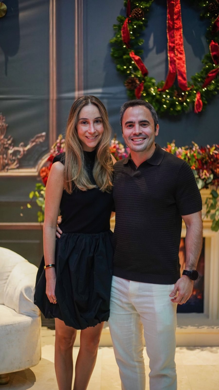 Maria Isabella and Jaime at a Christmas party